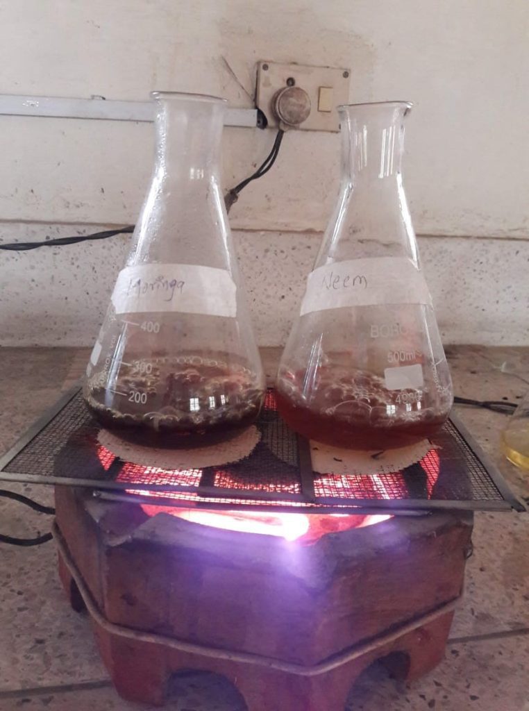 Heating of sample to remove excess moisture